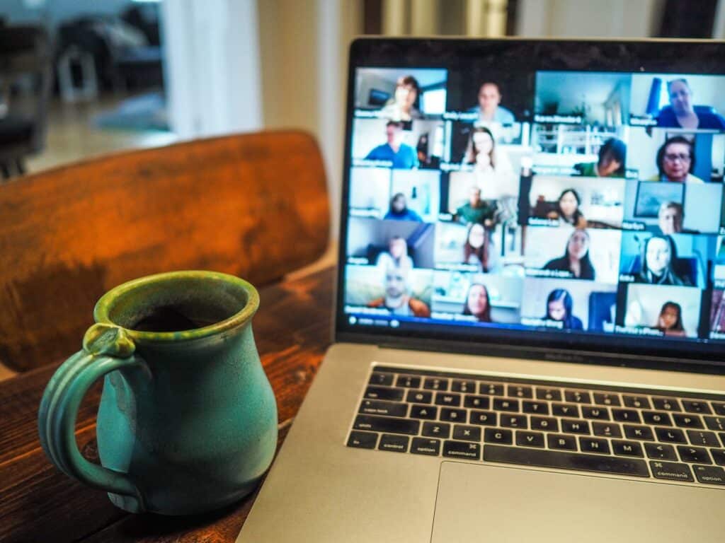 A laptop scrren in which a group meeting is going on.