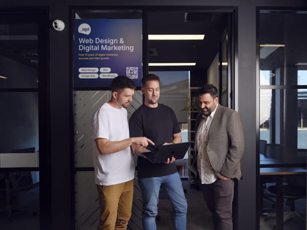 The SGD team reviewing a website